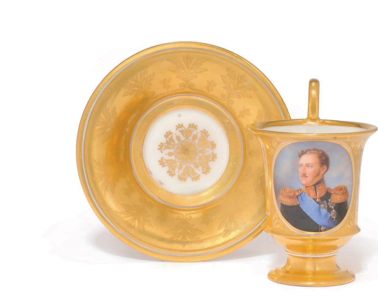 A CONTINENTAL PORCELAIN GOLD-GROUND PORTRAIT CUP AND SAUCER PAINTED WITH TSAR NICHOLAS I