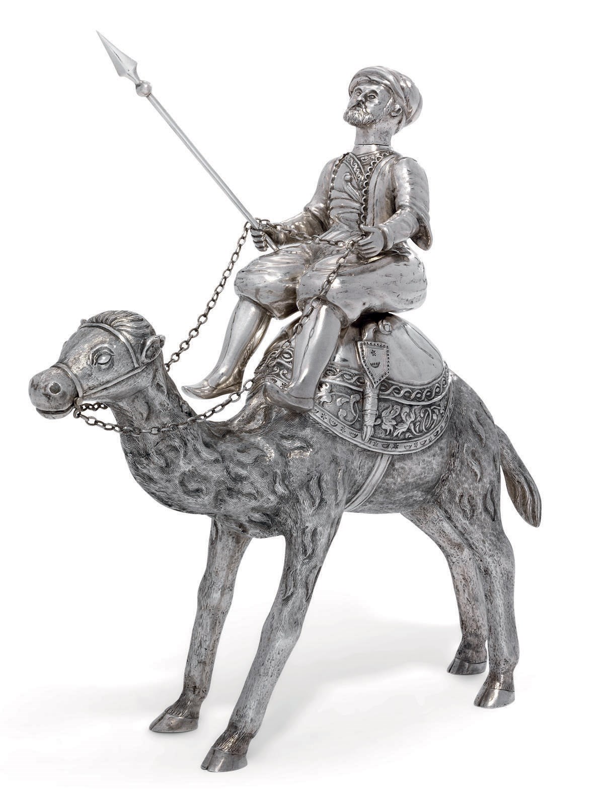 A CONTINENTAL SILVER CUP FORMED AS A MODEL OF A CAMEL AND RIDER