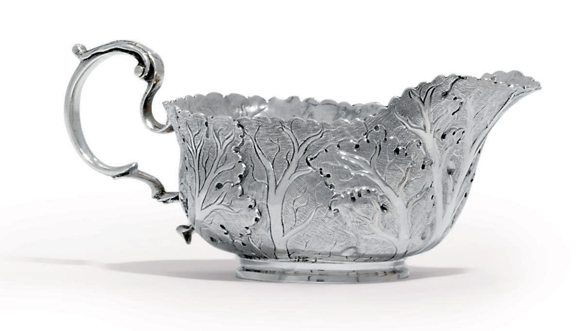 A GEORGE III SILVER CREAM-BOAT