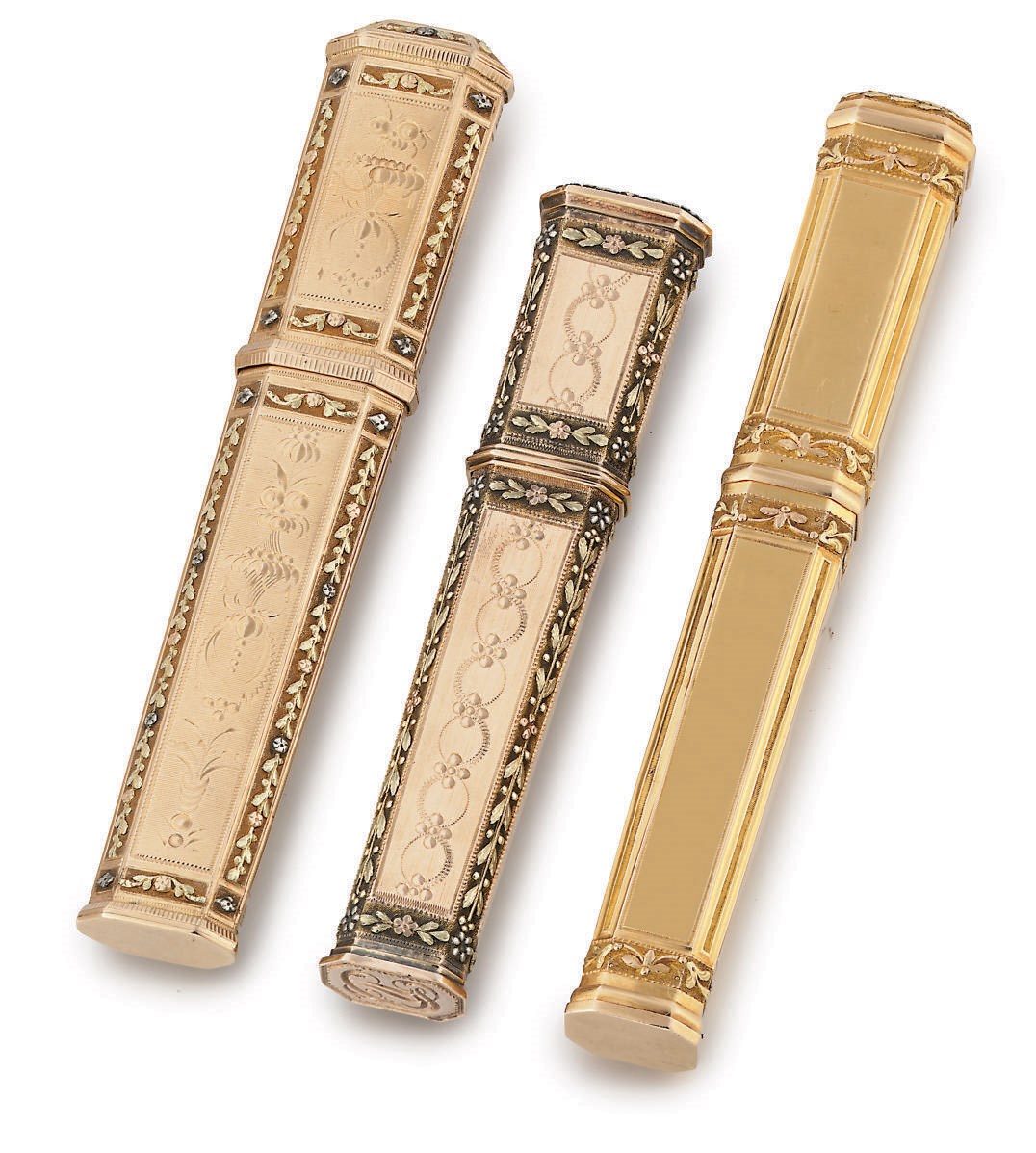 TWO SWISS VARI-COLOUR GOLD ÉTUIS AND A LOUIS XVI THREE-COLOUR GOLD ÉTUI