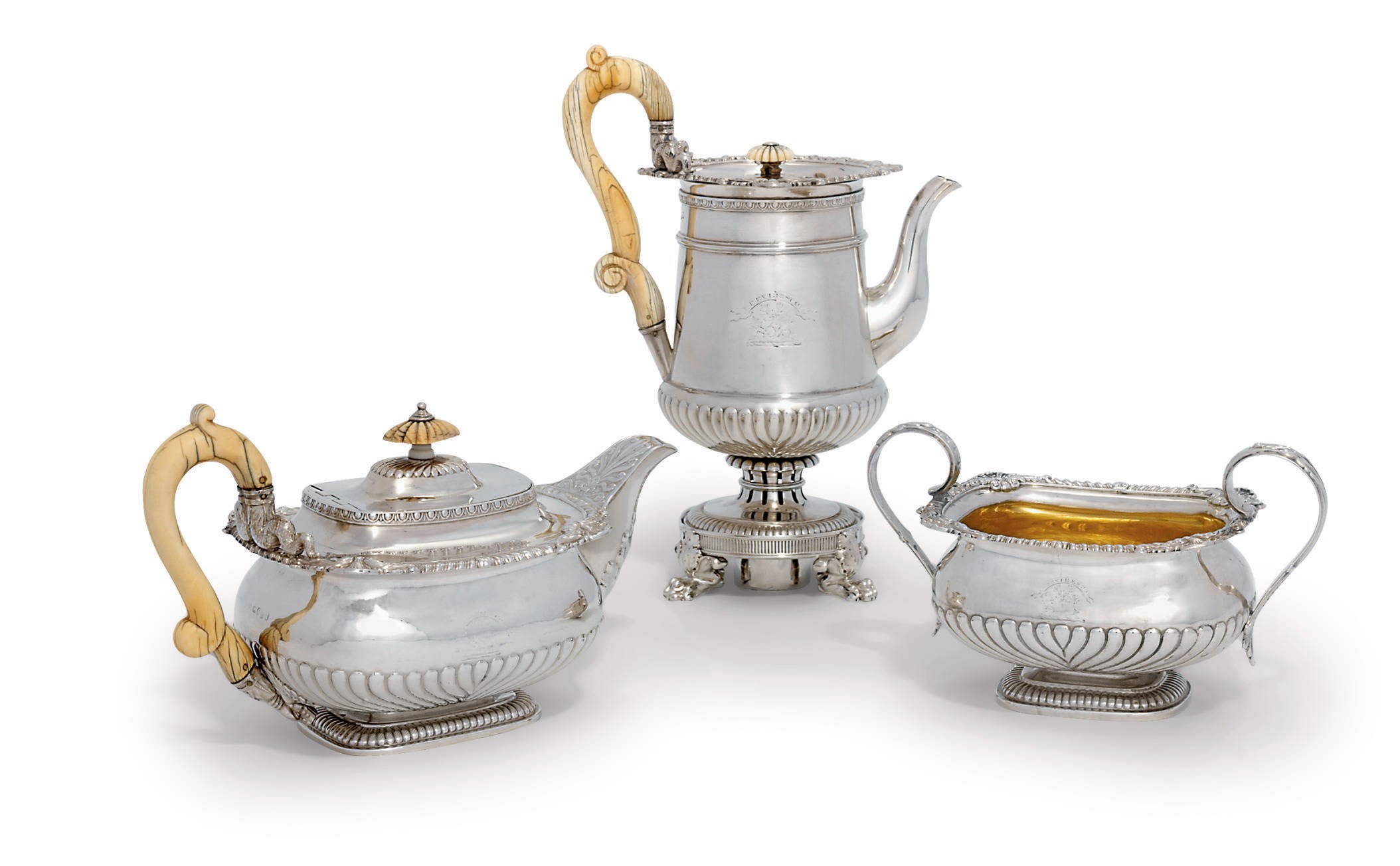 A GEORGE III THREE-PIECE SILVER TEA AND COFFEE-SERVICE