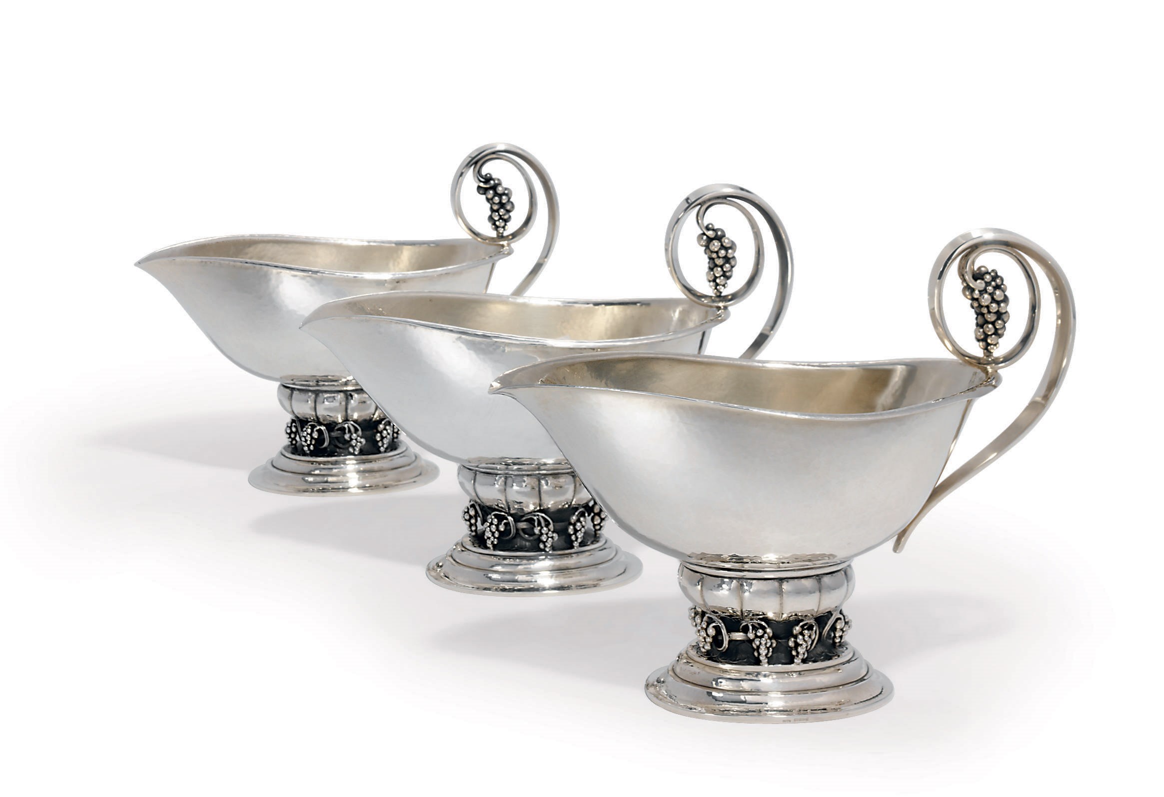A SET OF THREE DANISH SAUCEBOATS DESIGNED BY GEORG JENSEN