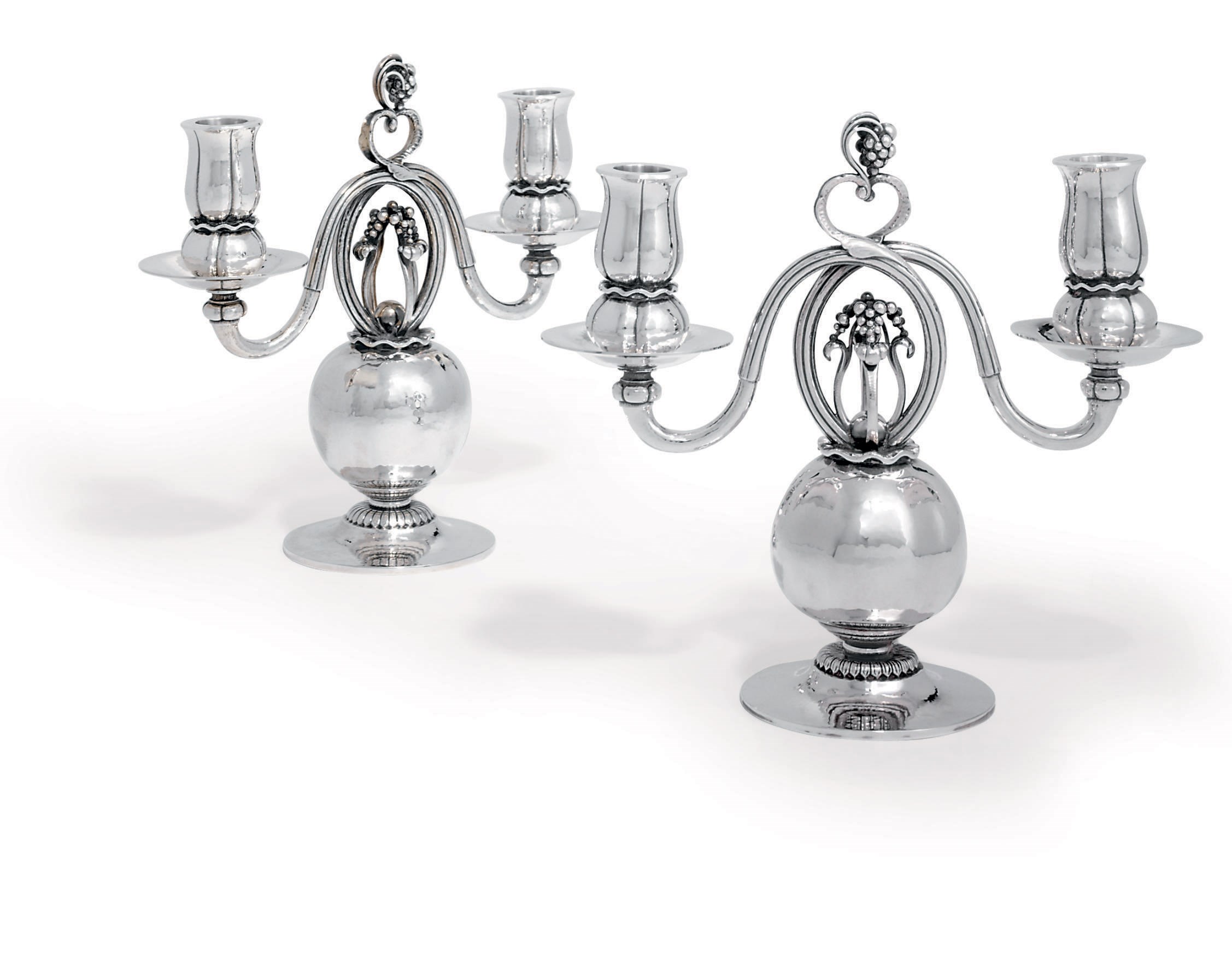 A PAIR OF DANISH TWO-LIGHT CANDELABRA DESIGNED BY GEORG JENSEN