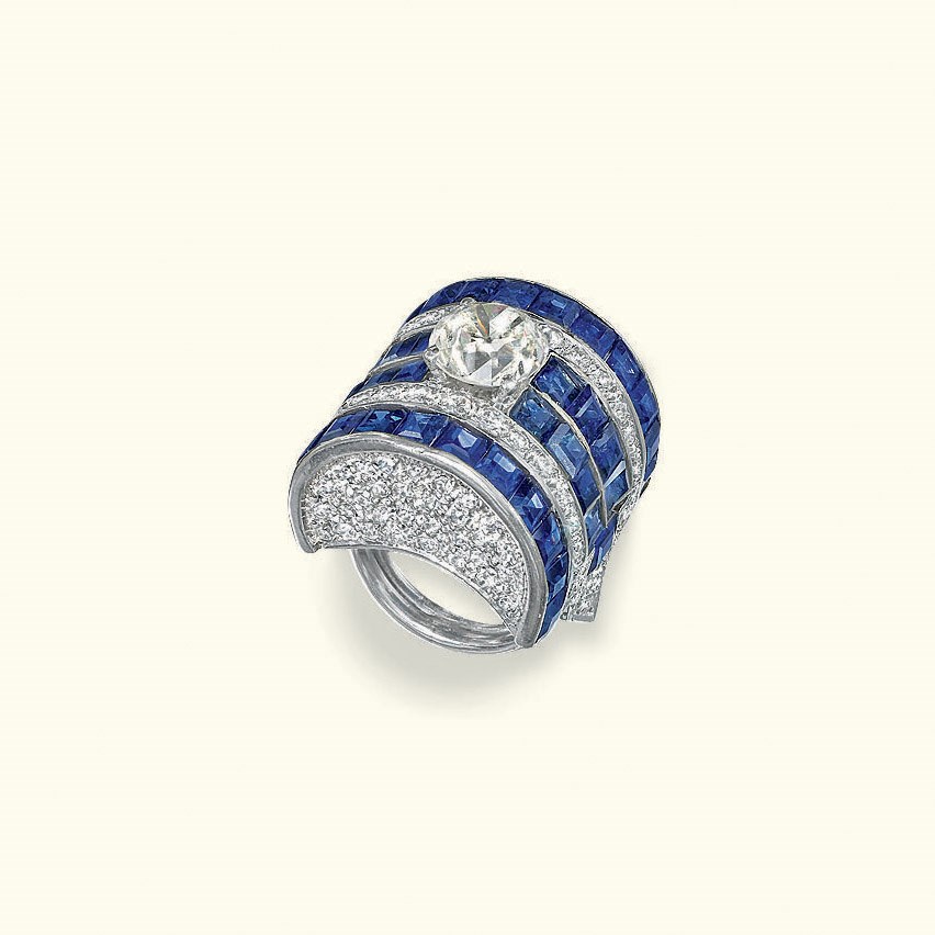 A SAPPHIRE AND DIAMOND RING