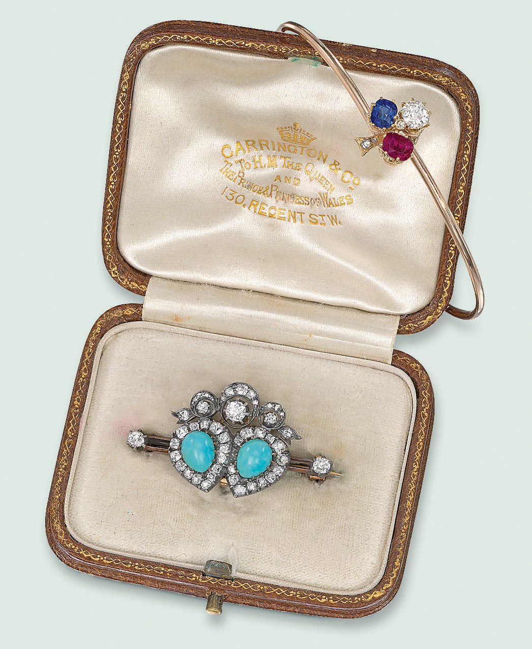 AN ANTIQUE TURQUOISE AND DIAMOND BROOCH AND A GEM-SET BANGLE