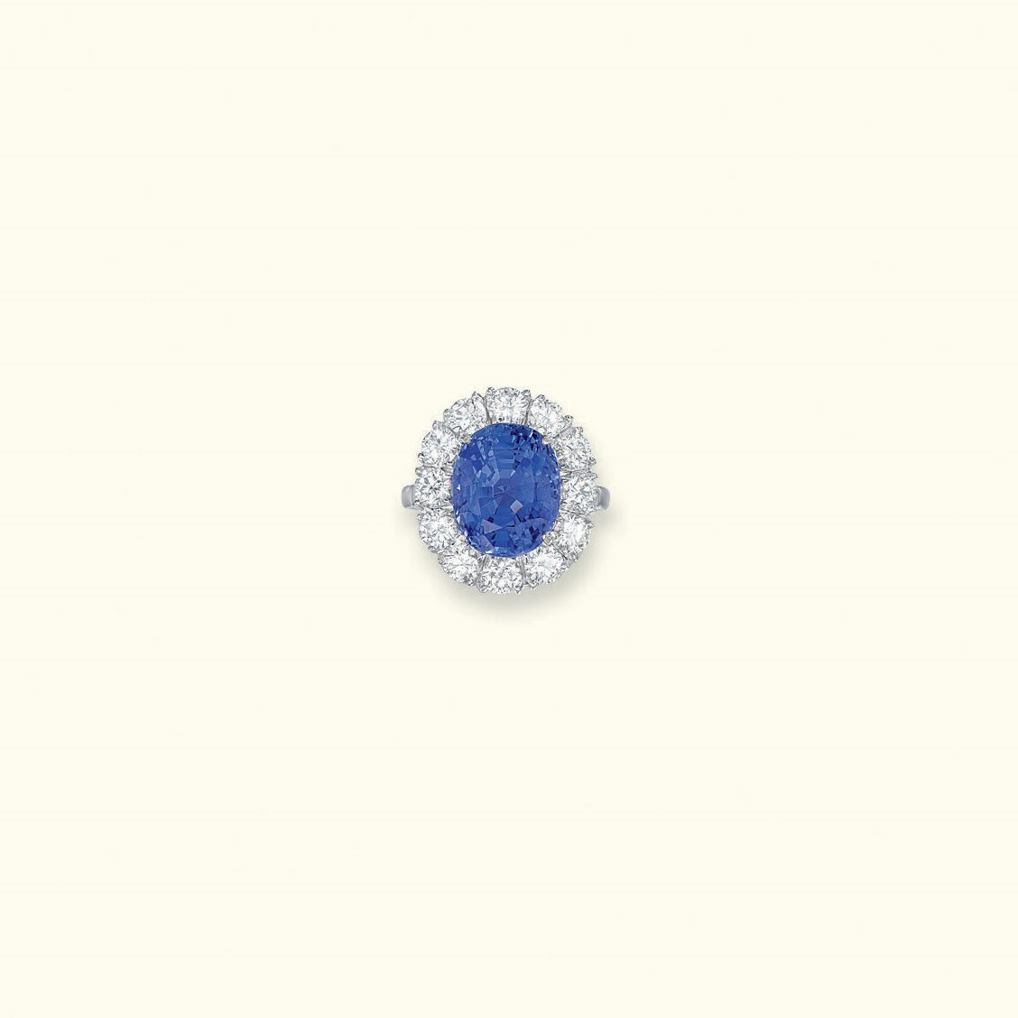 A SAPPHIRE AND DIAMOND RING