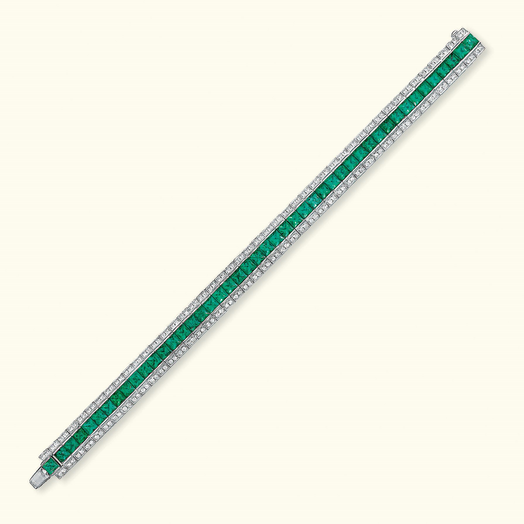 AN EMERALD AND DIAMOND BRACELET