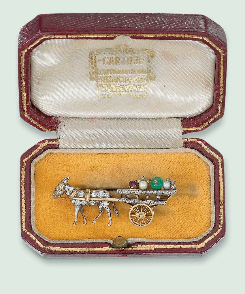 AN ART DECO DIAMOND AND GEM-SET NOVELTY BROOCH, BY CARTIER