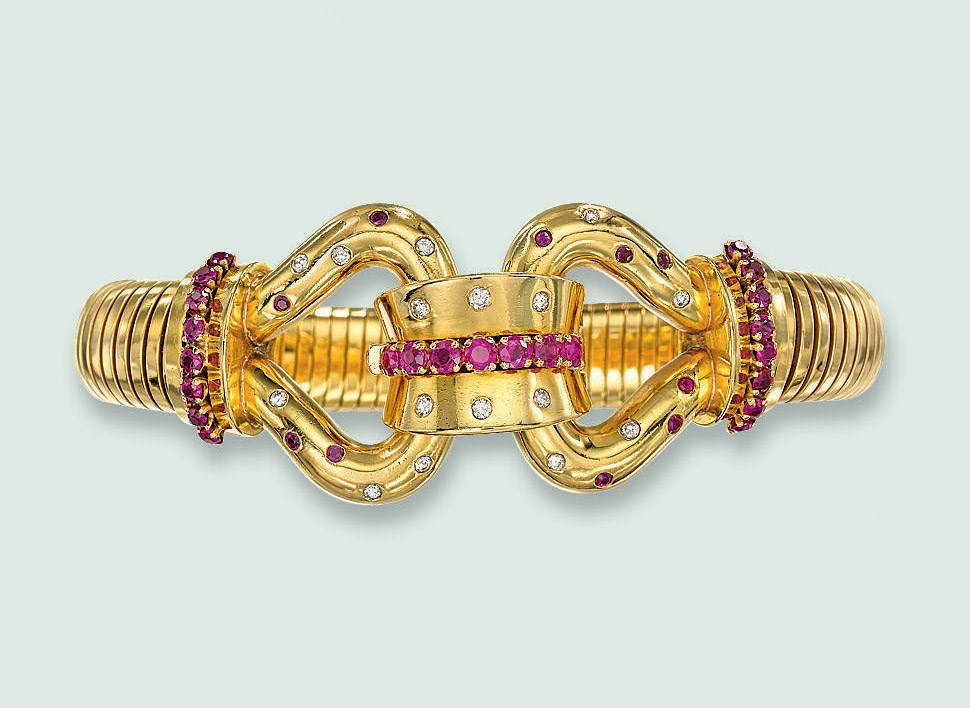 A RETRO DIAMOND AND RUBY BRACELET, BY CARTIER