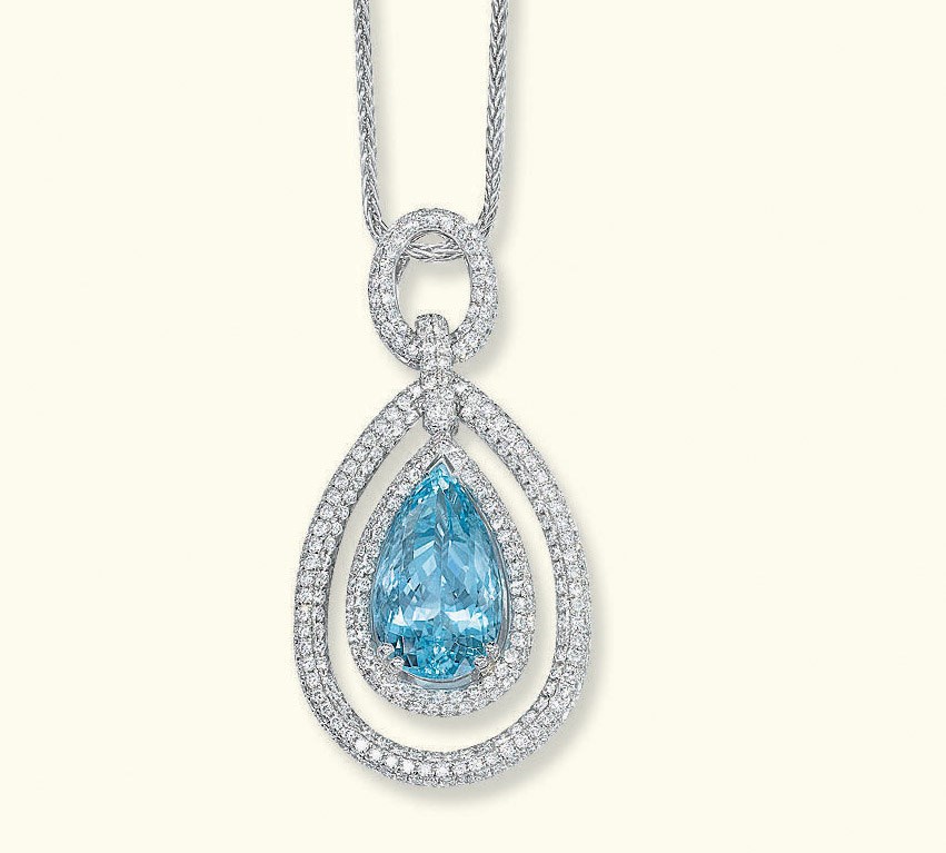 AN AQUAMARINE AND DIAMOND PENDANT