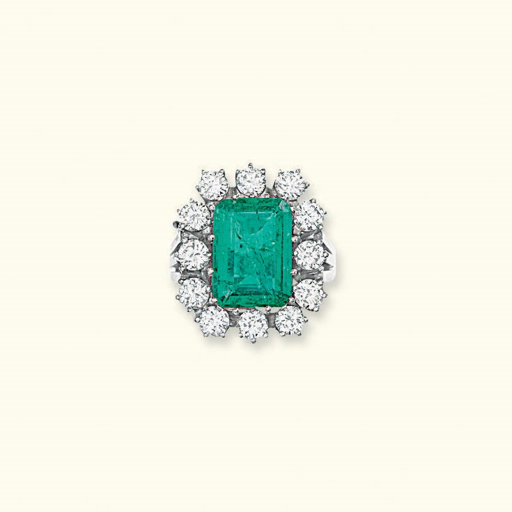 AN EMERALD AND DIAMOND RING
