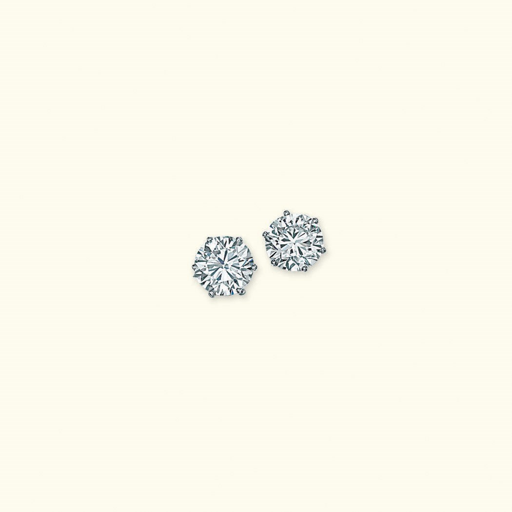 A PAIR OF DIAMOND SINGLE-STONE EAR STUDS