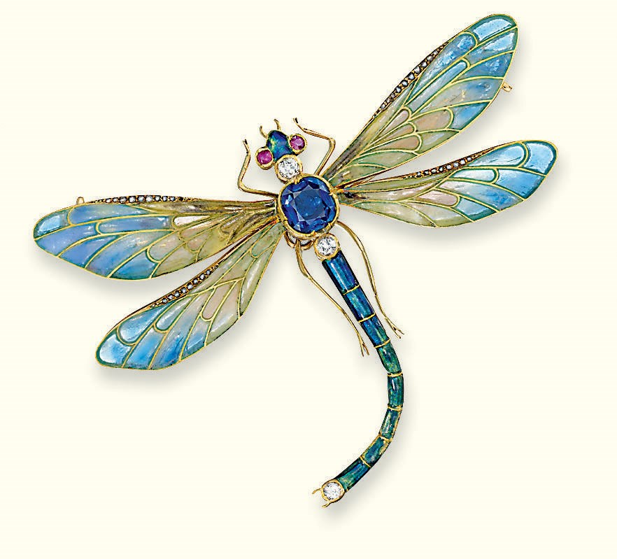 AN EARLY 20TH CENTURY ENAMEL AND GEM-SET BROOCH