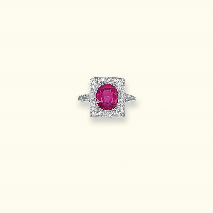 AN EARLY 2OTH CENTURY RUBY AND DIAMOND RING