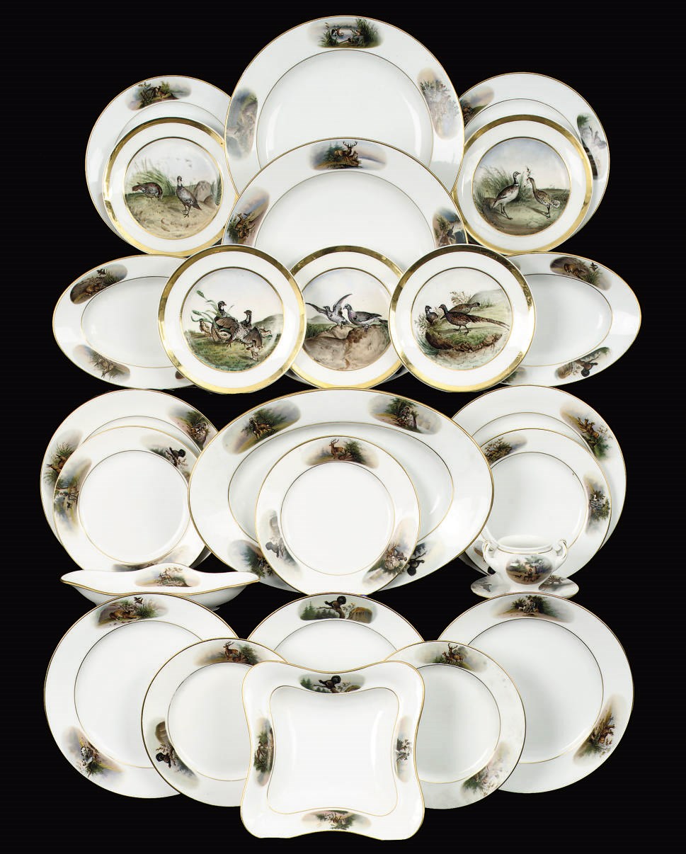 A German porcelain 'hunting scene' part dinner service