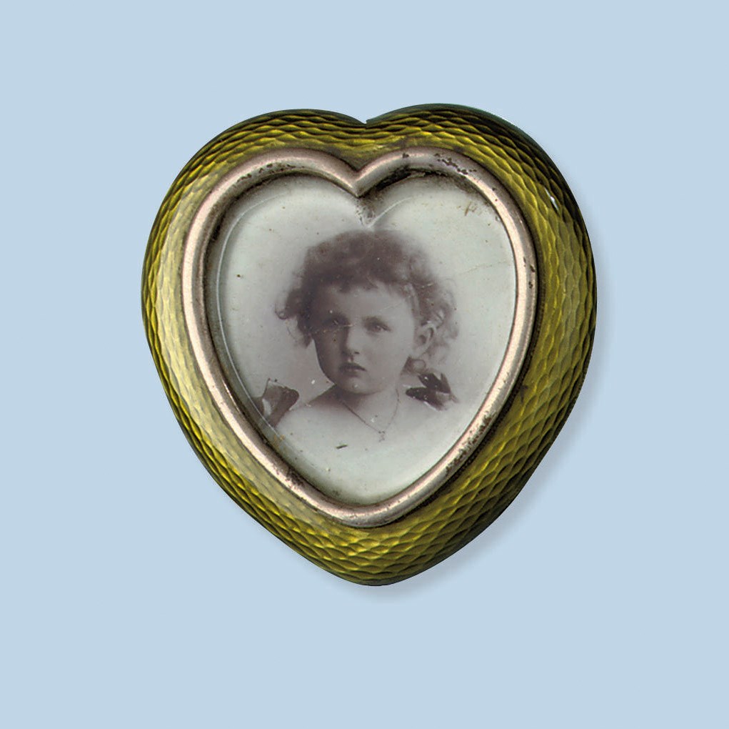 A COLLECTION OF PHOTOFRAMES AND A CIGARETTE CASE