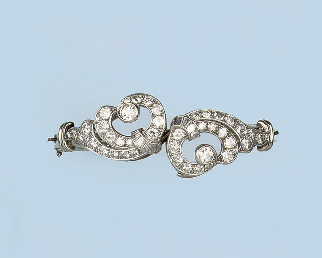 A DIAMOND BANGLE/PAIR OF CLIPS