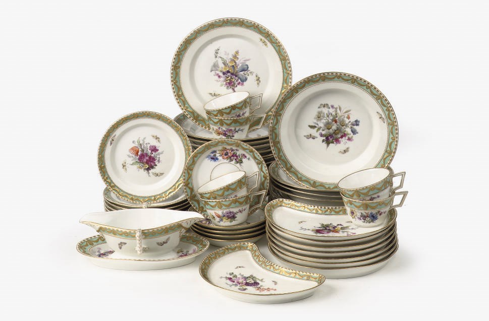 A Berlin KPM porcelain 'Kurland Muster' part dinner service