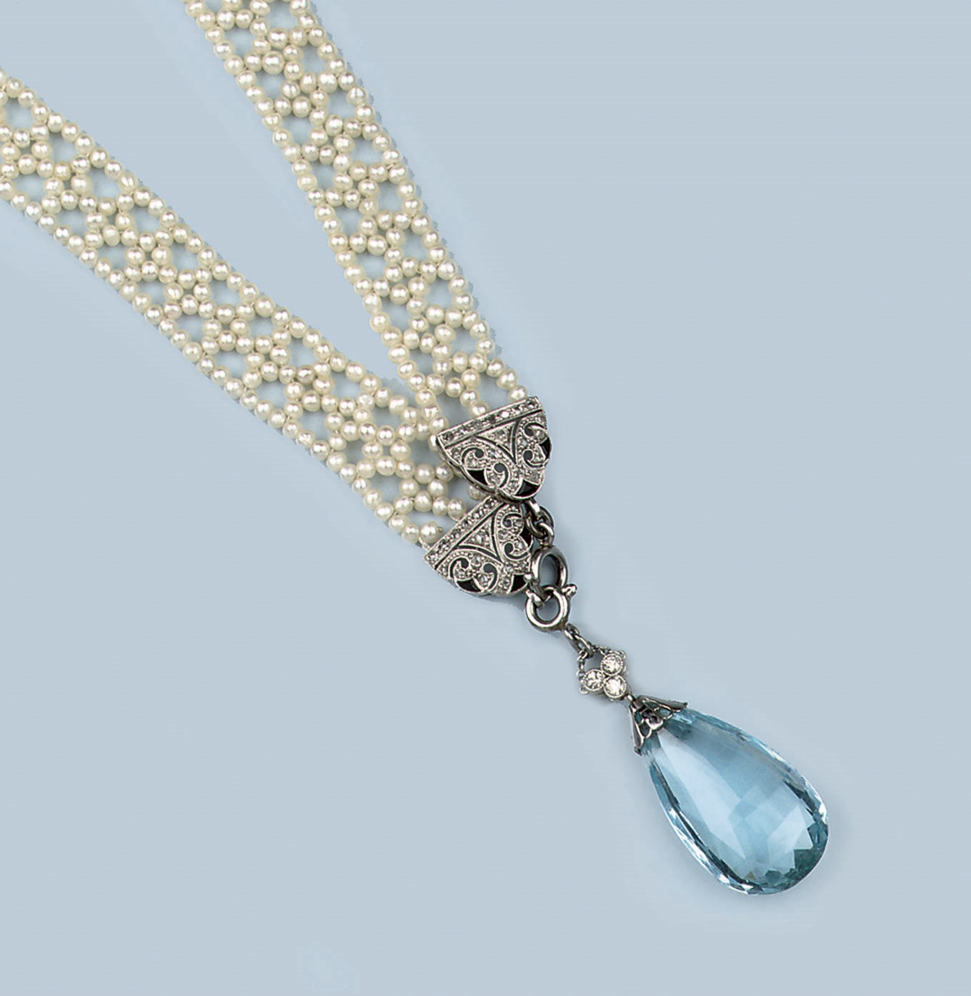 A BELLE EPOQUE AQUAMARINE AND SEEDPEARL SAUTOIR
