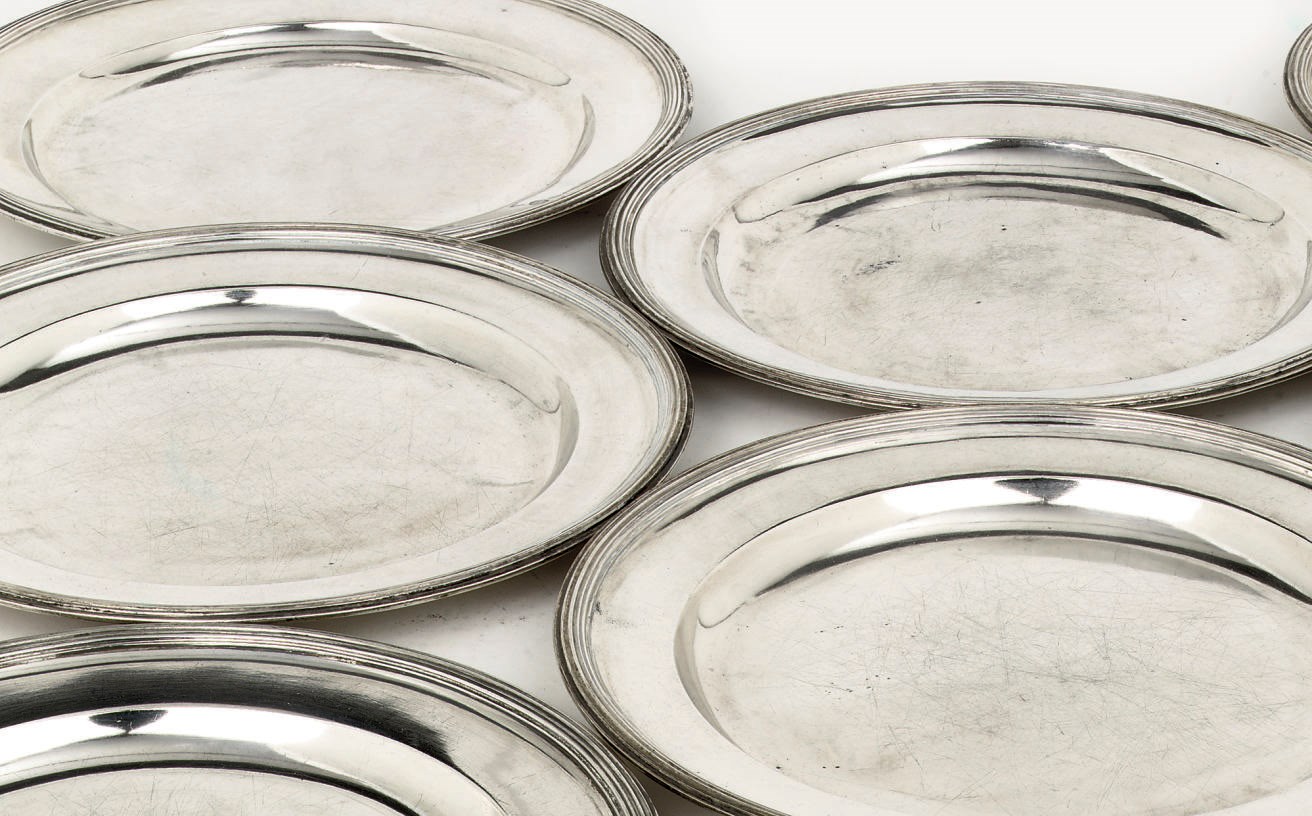 A set of ten Swedish Royal silver dinner plates