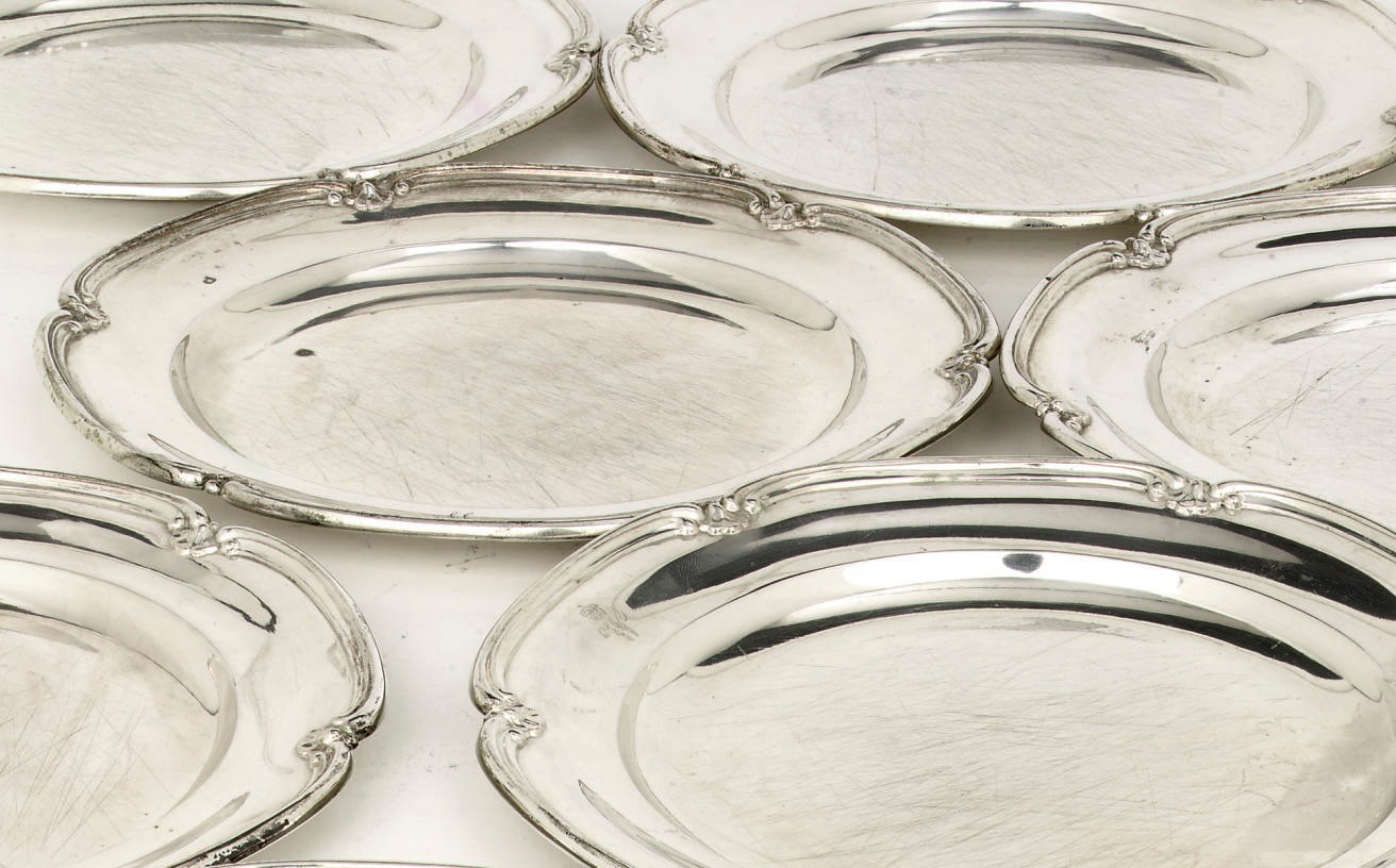 A set of ten Royal German silver dinner plates