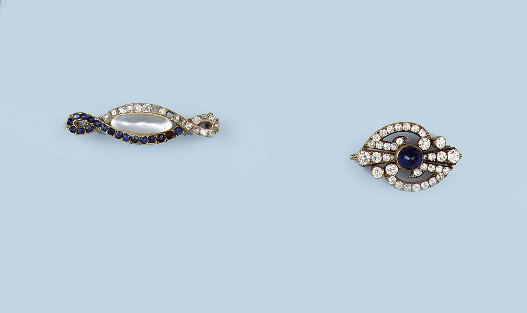 TWO ANTIQUE GEM SET AND DIAMOND BROOCHES
