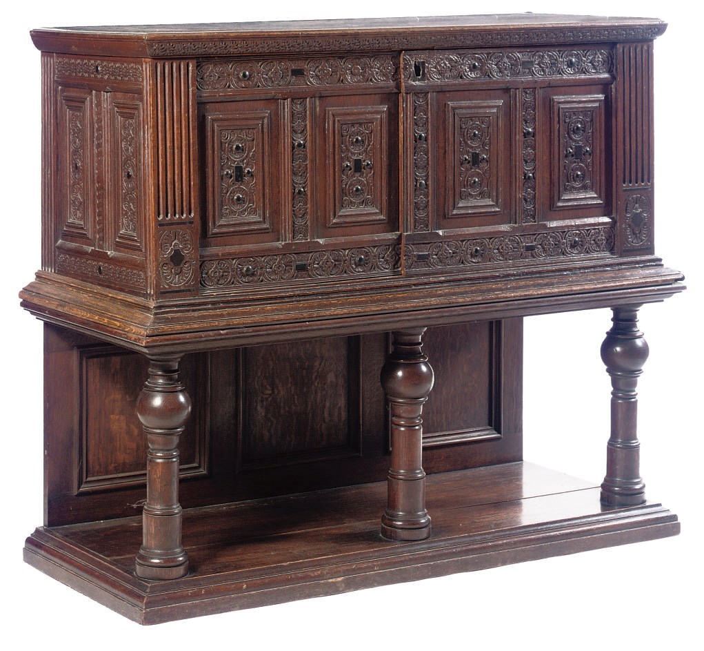 A FLEMISH OAK AND EBONY CHEST-ON-STAND