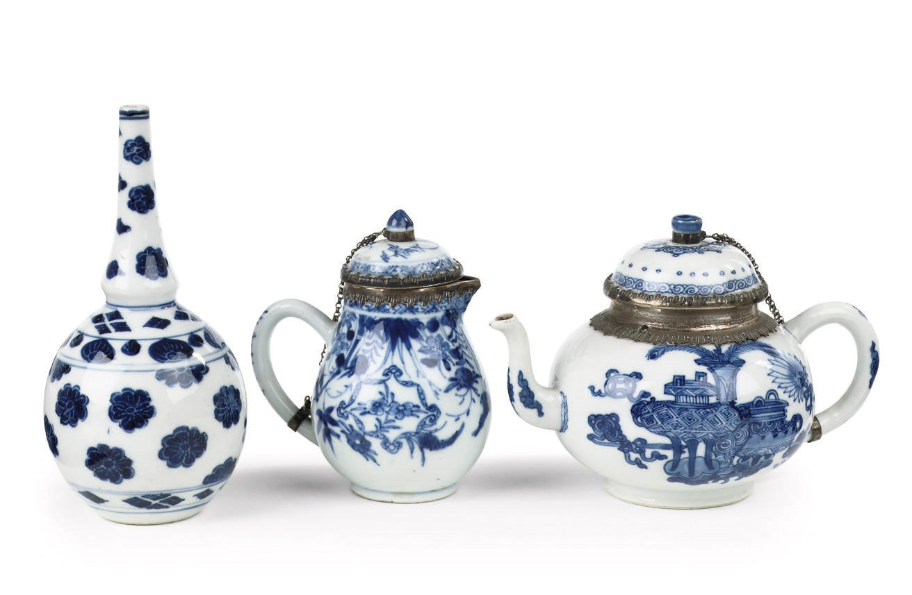 A Chinese blue and white sprinkler, a silver-mounted teapot and cover and a silver-mounted milk-jug and cover