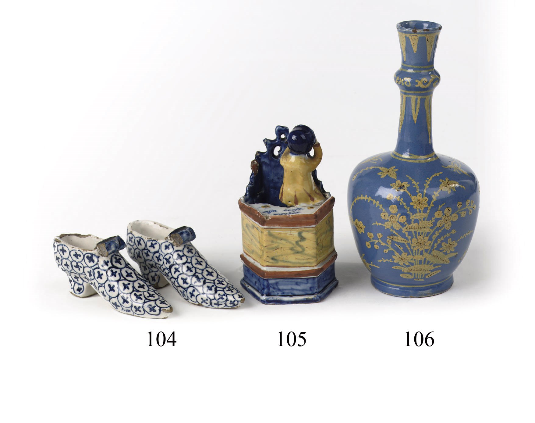 A Dutch Delft small blue-ground bottle vase