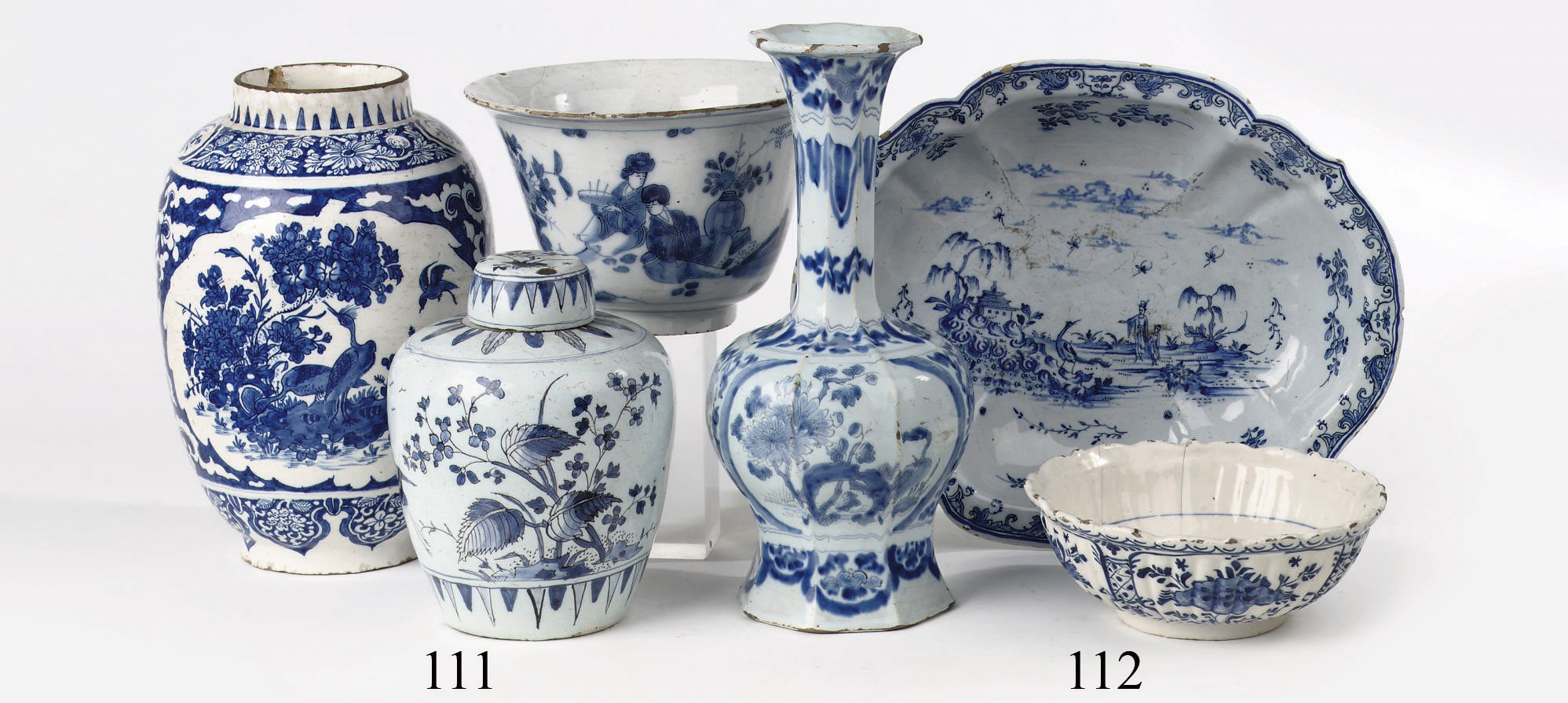 A Dutch Delft blue and white Chinoiserie bottle vase, basin and bowl