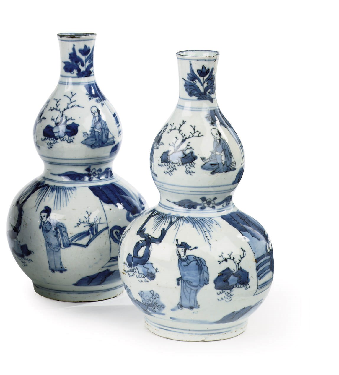 A matched pair of Chinese Transitional blue and white double-gourd vases