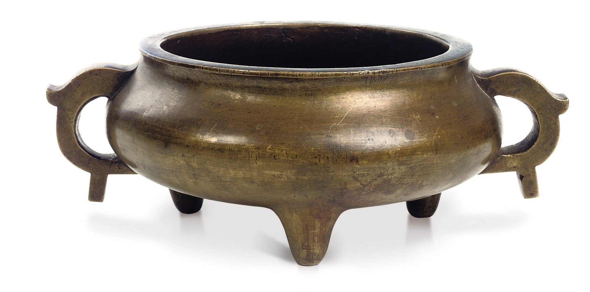 A Chinese bronze tripod censer
