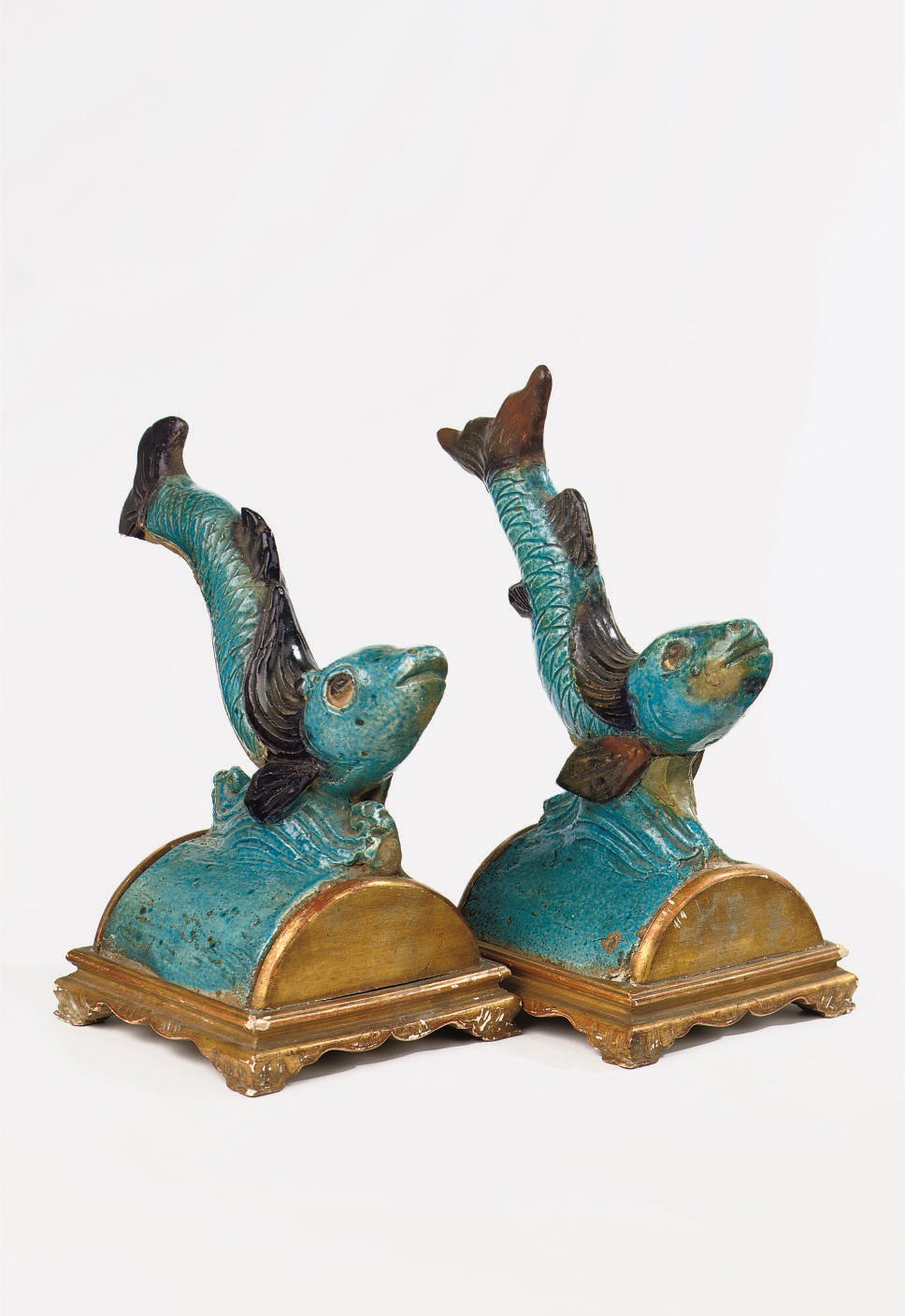A pair of Chinese late Ming turquoise- and aubergine- glazed rooftiles