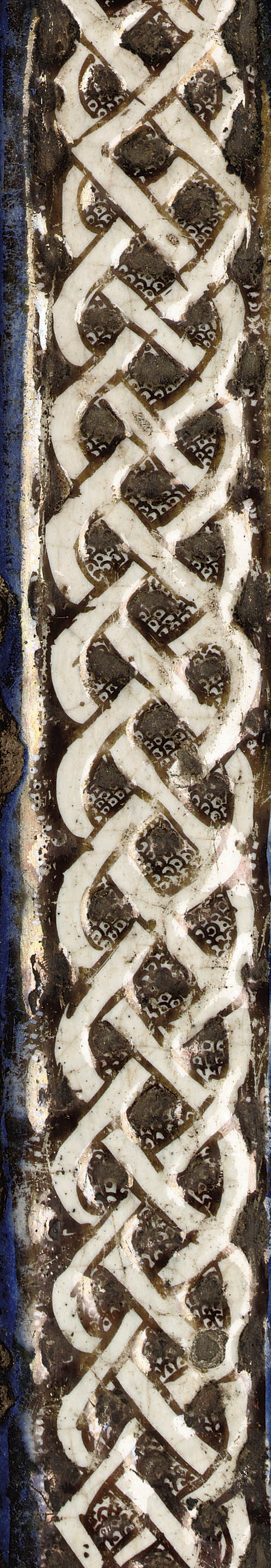 A Kashan lustre pottery moulded tile