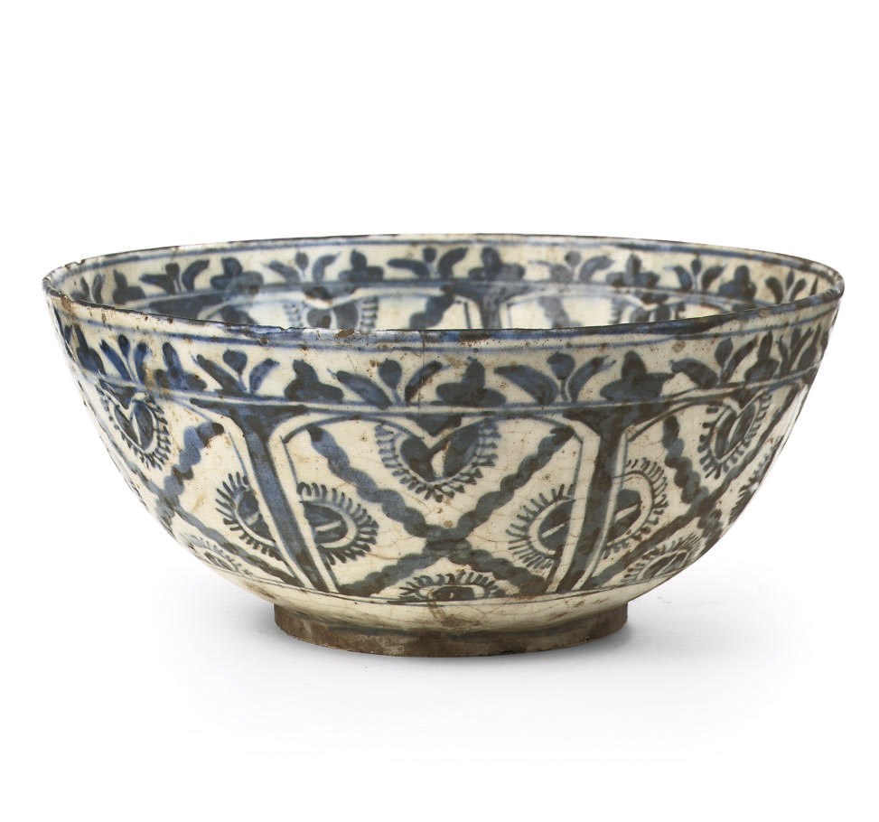 A large blue and white pottery bowl