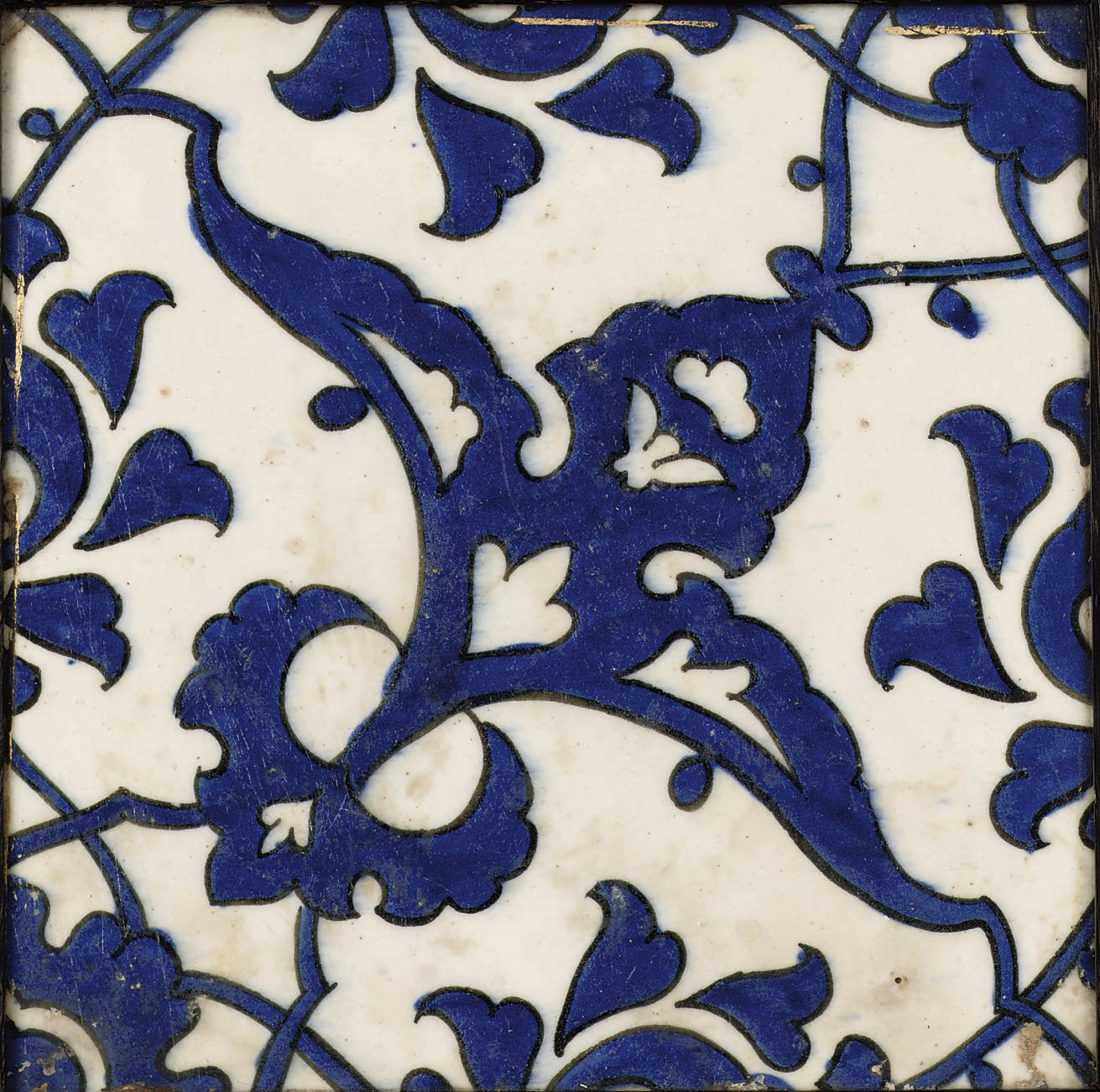 A blue and white 'Dome of the Rock' framed pottery tile