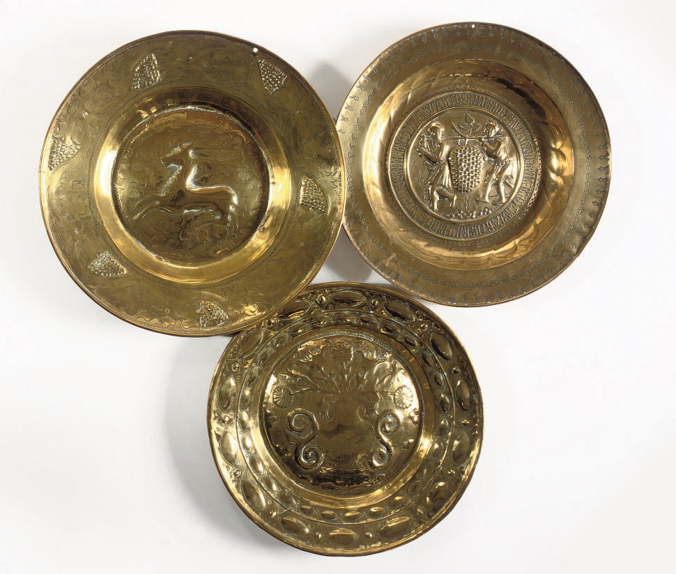 THREE VARIOUS BRASS ALMS DISHES
