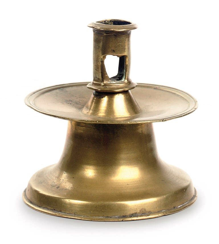 A DUTCH BRASS CANDLE STICK 'KRAAGKANDELAAR'