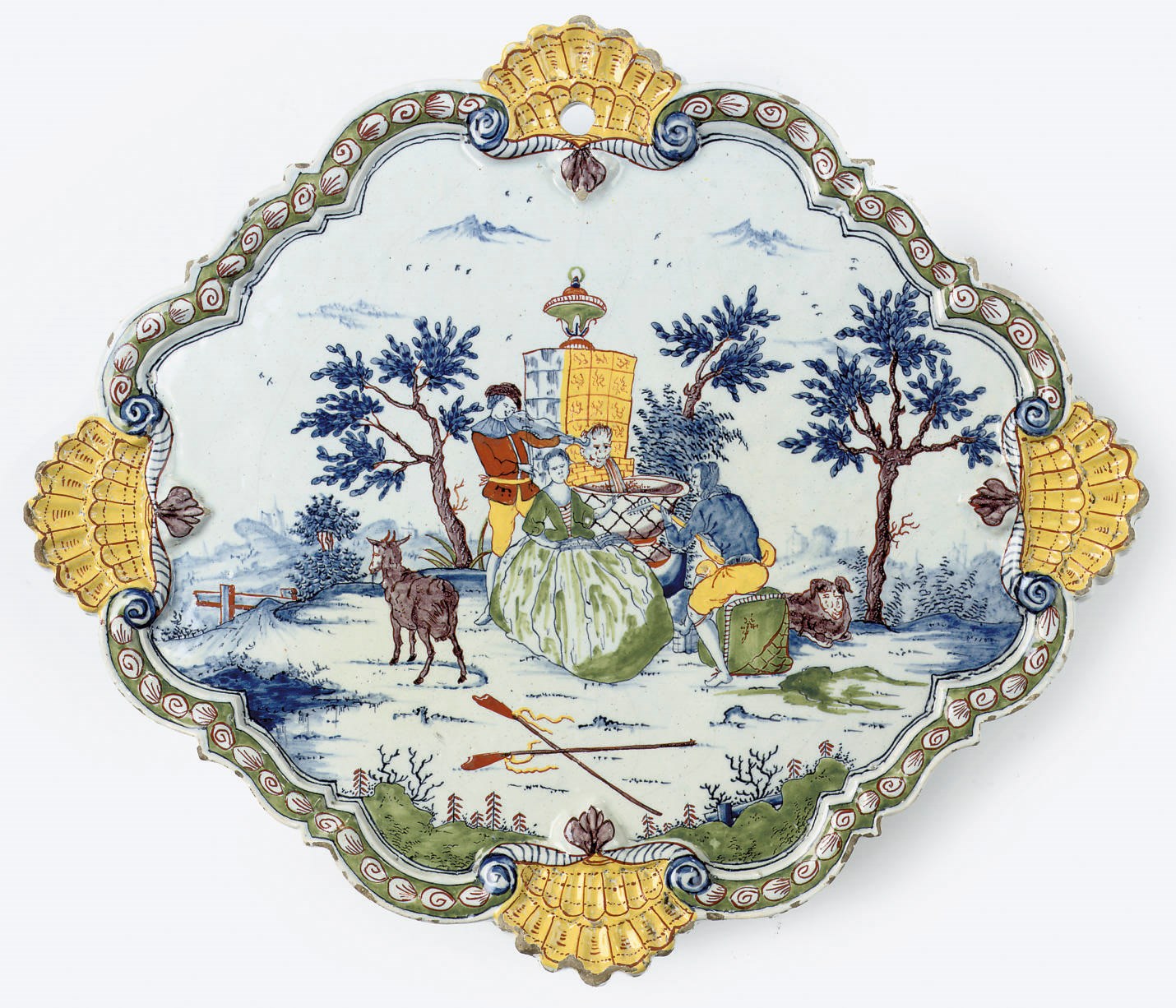 A Dutch Delft polychrome ogival plaque