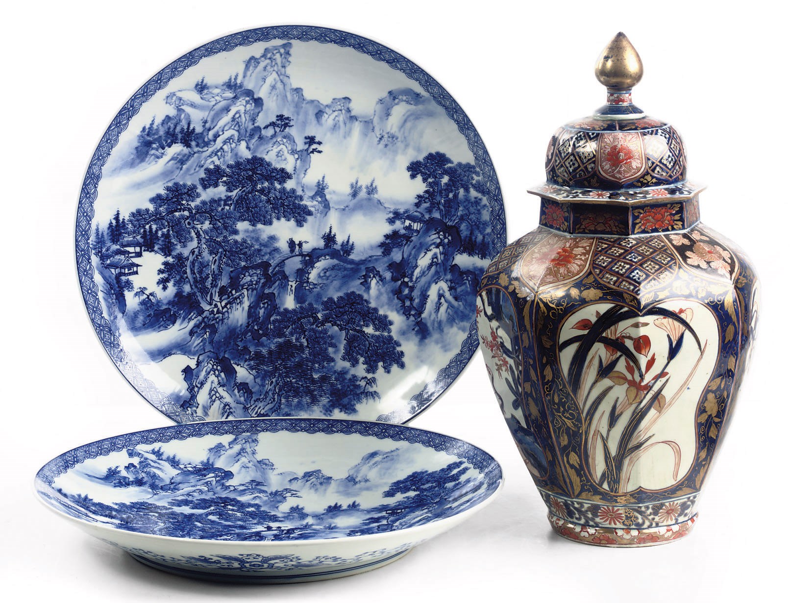 A French Samson Imari jar and cover and a pair of Japanese Arita blue and white chargers