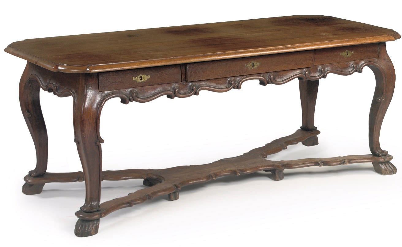 A GERMAN OAK AND WALNUT CENTRE TABLE