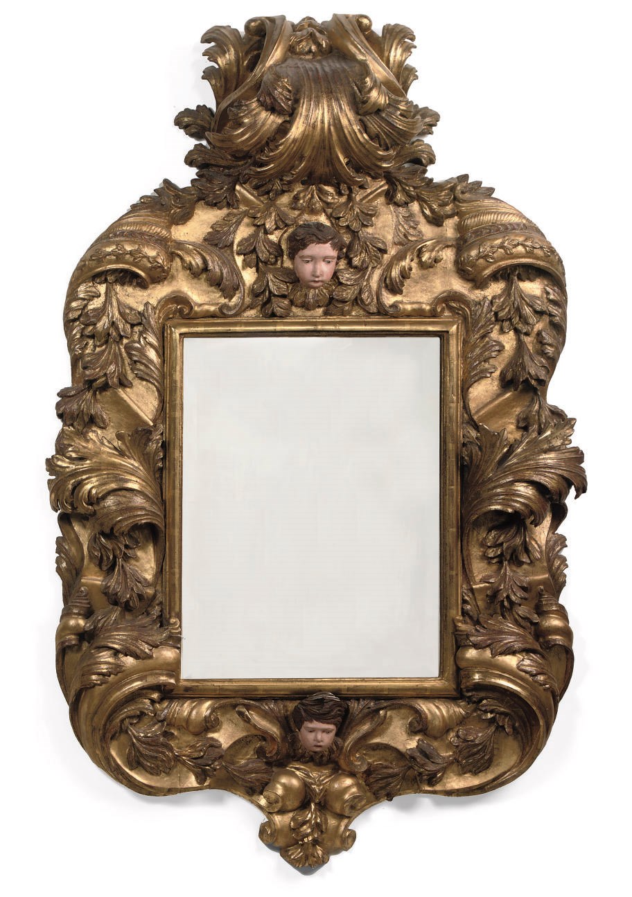 A SPANISH GILTWOOD MIRROR