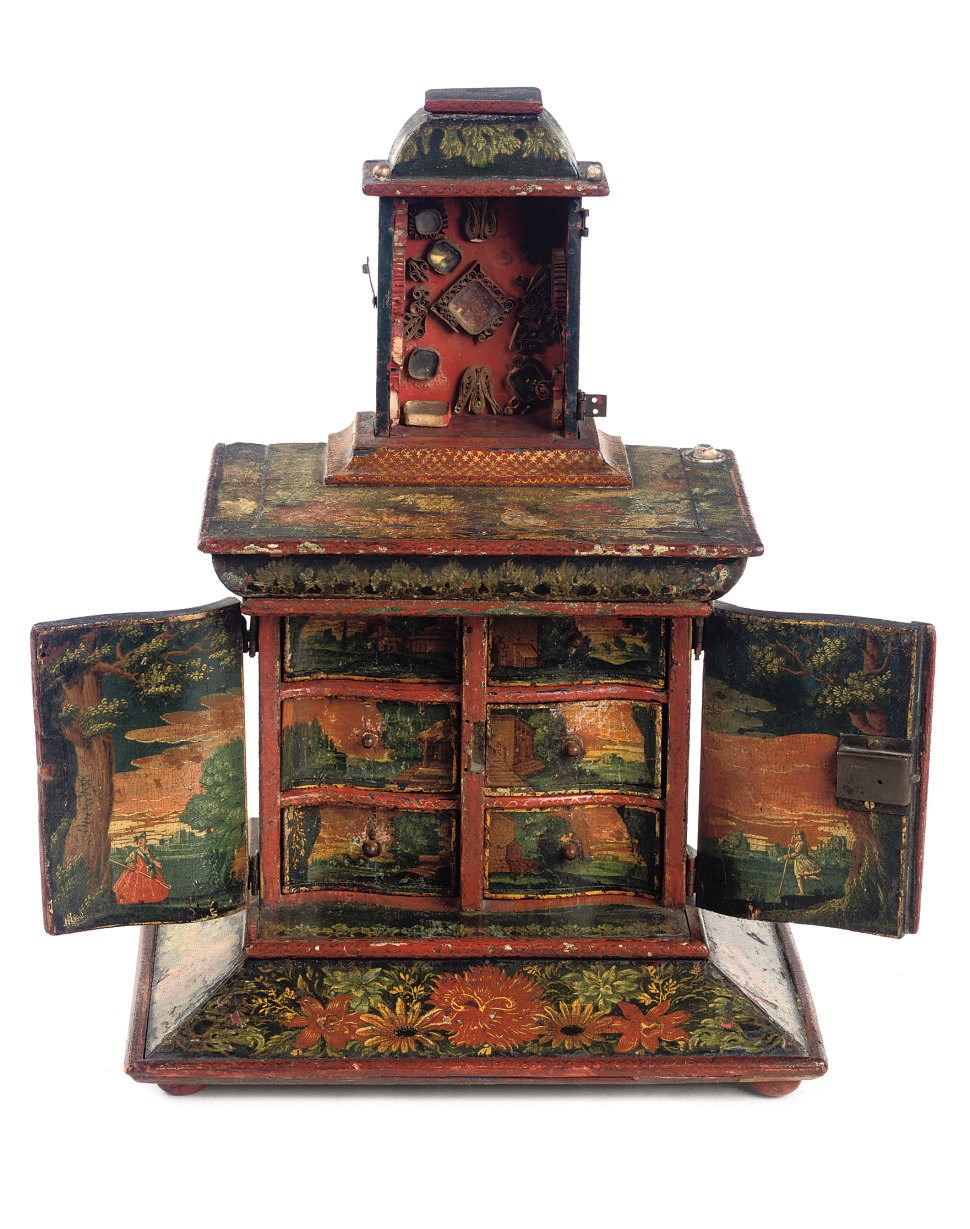 A POLYCHROME DECORATED MINIATURE RELIQUARY CABINET