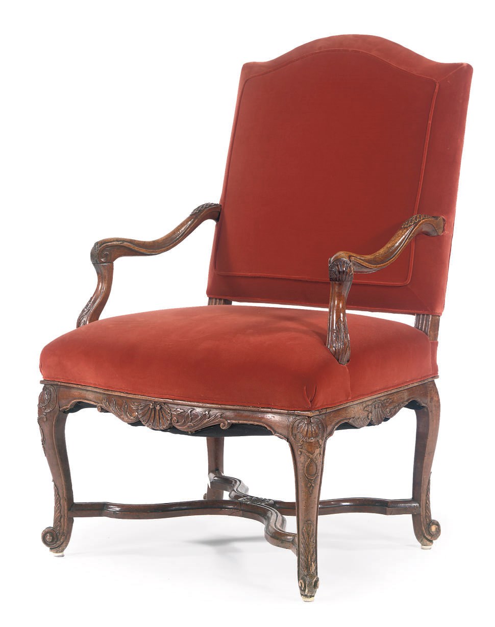 A REGENCE WALNUT OPEN ARMCHAIR