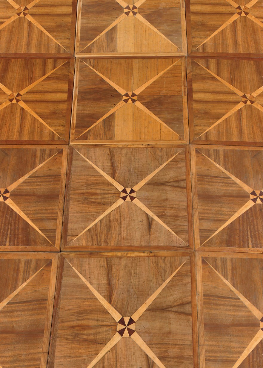 AN AUSTRIAN WALNUT, MAPLE AND PADOUK PARQUET FLOOR