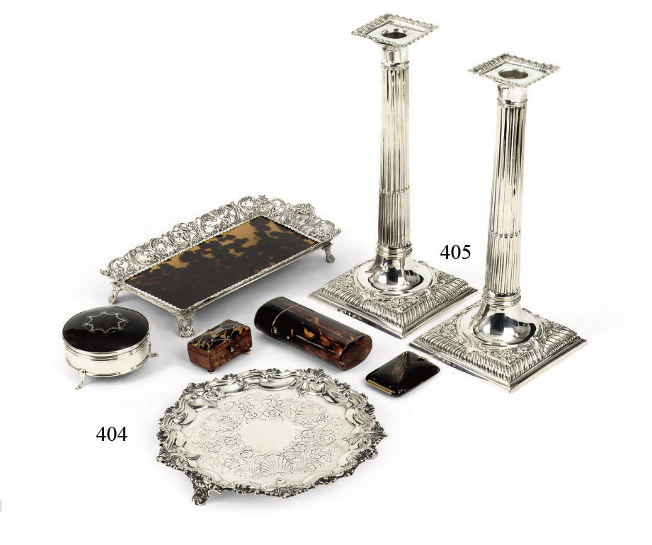 A pair of English silver candlesticks