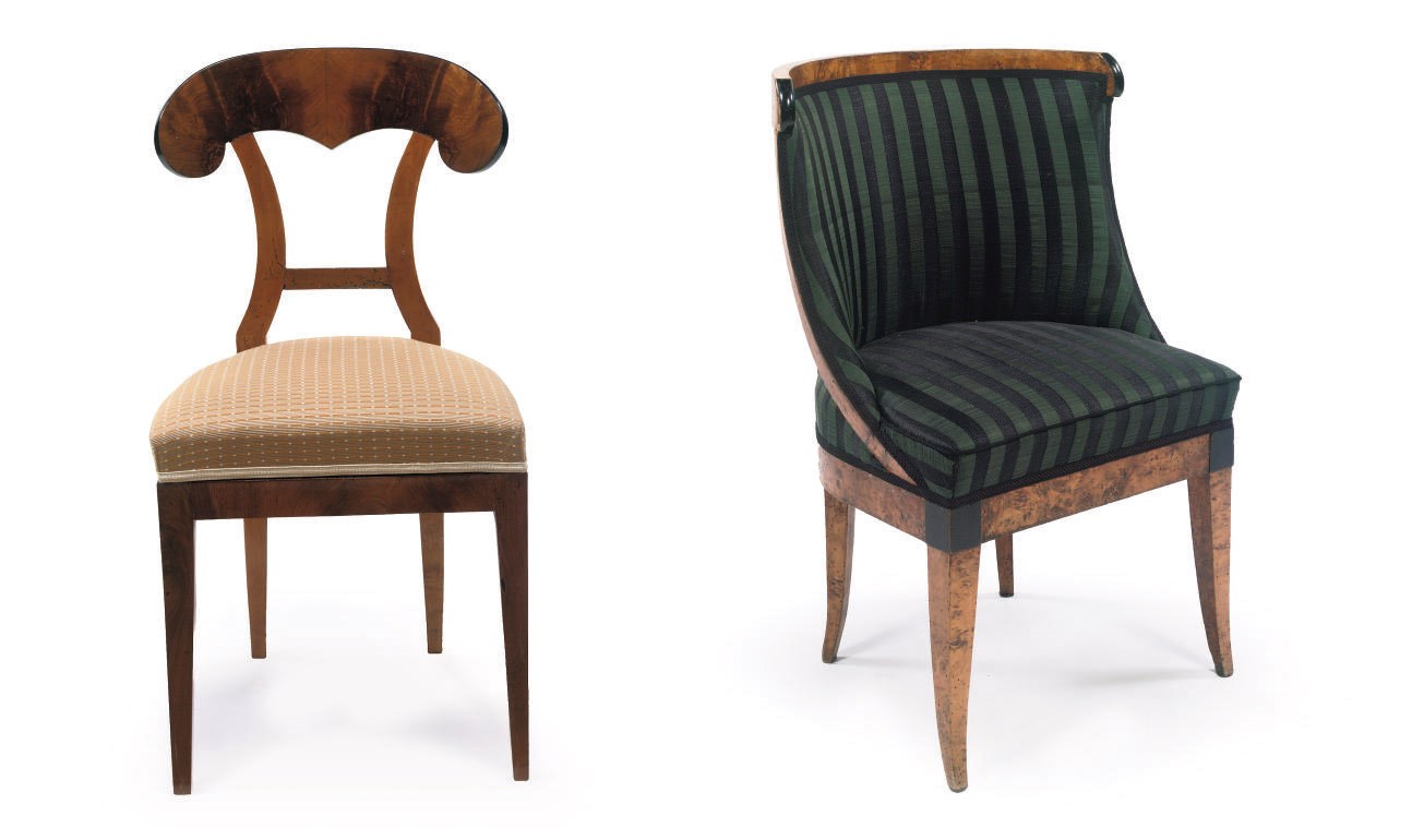 A SET OF FOUR AUSTRIAN BIEDERMEIER WALNUT SIDE CHAIRS