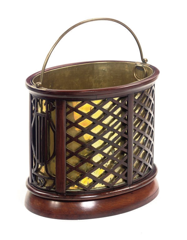 AN ENGLISH MAHOGANY TEA STOVE