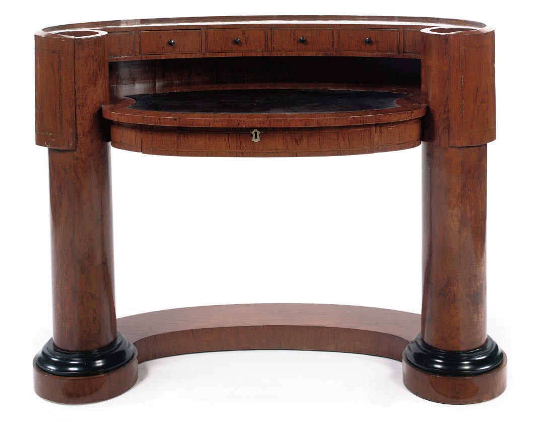 AN AUSTRIAN MAHOGANY AND EBONIZED DESK