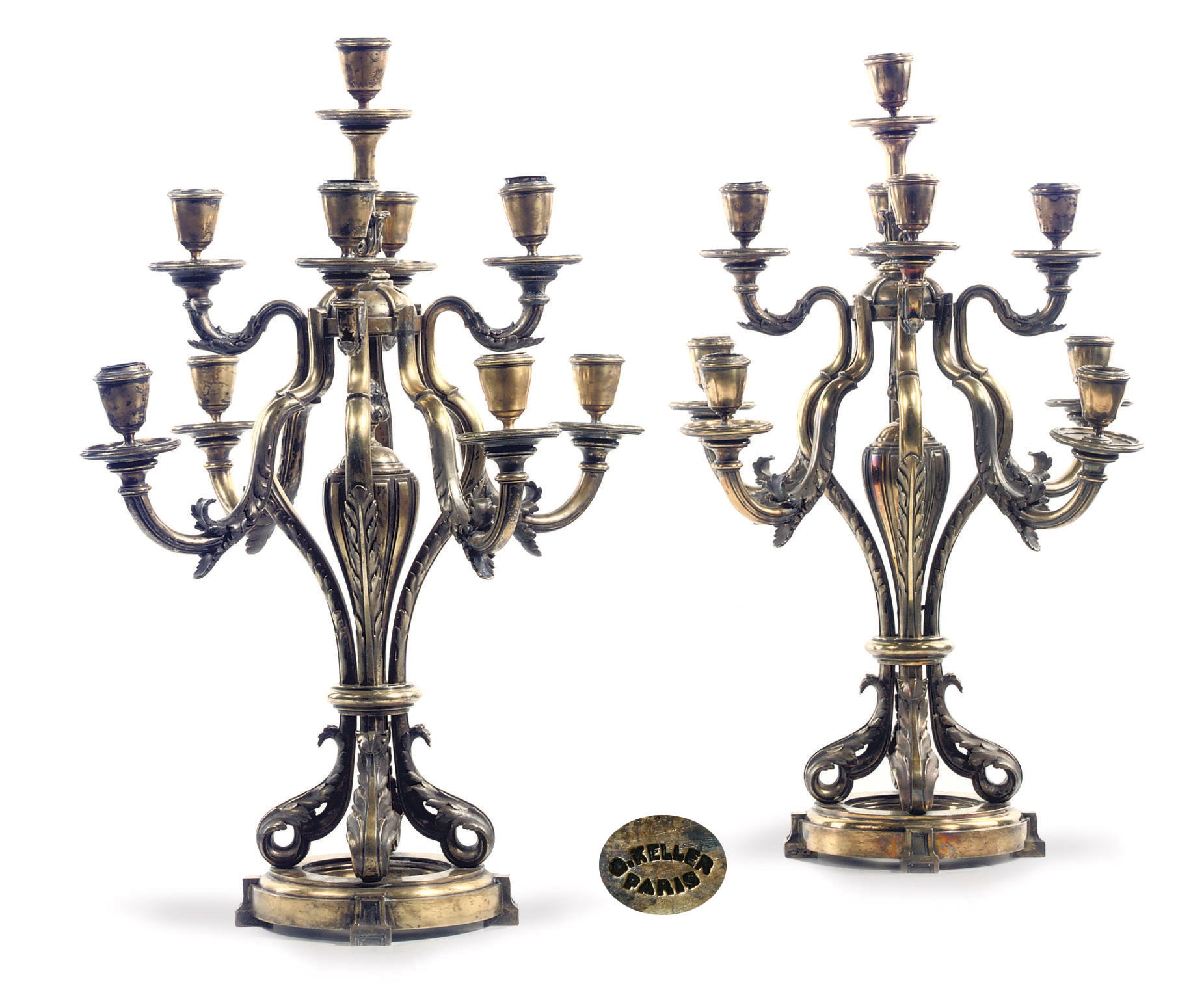 A pair of French silver nine-light candelabra